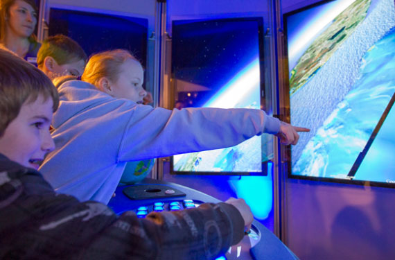 kid pointing at screen