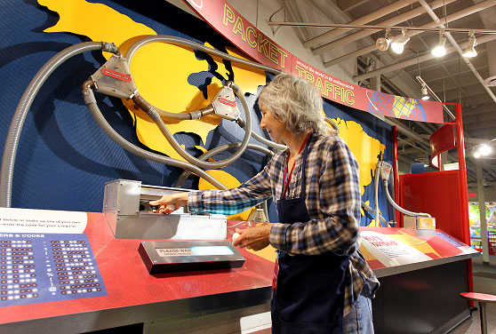 packet lady at exhibit