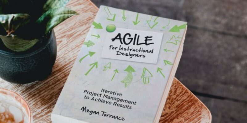 The Agile for Instructional Designers book on a table.